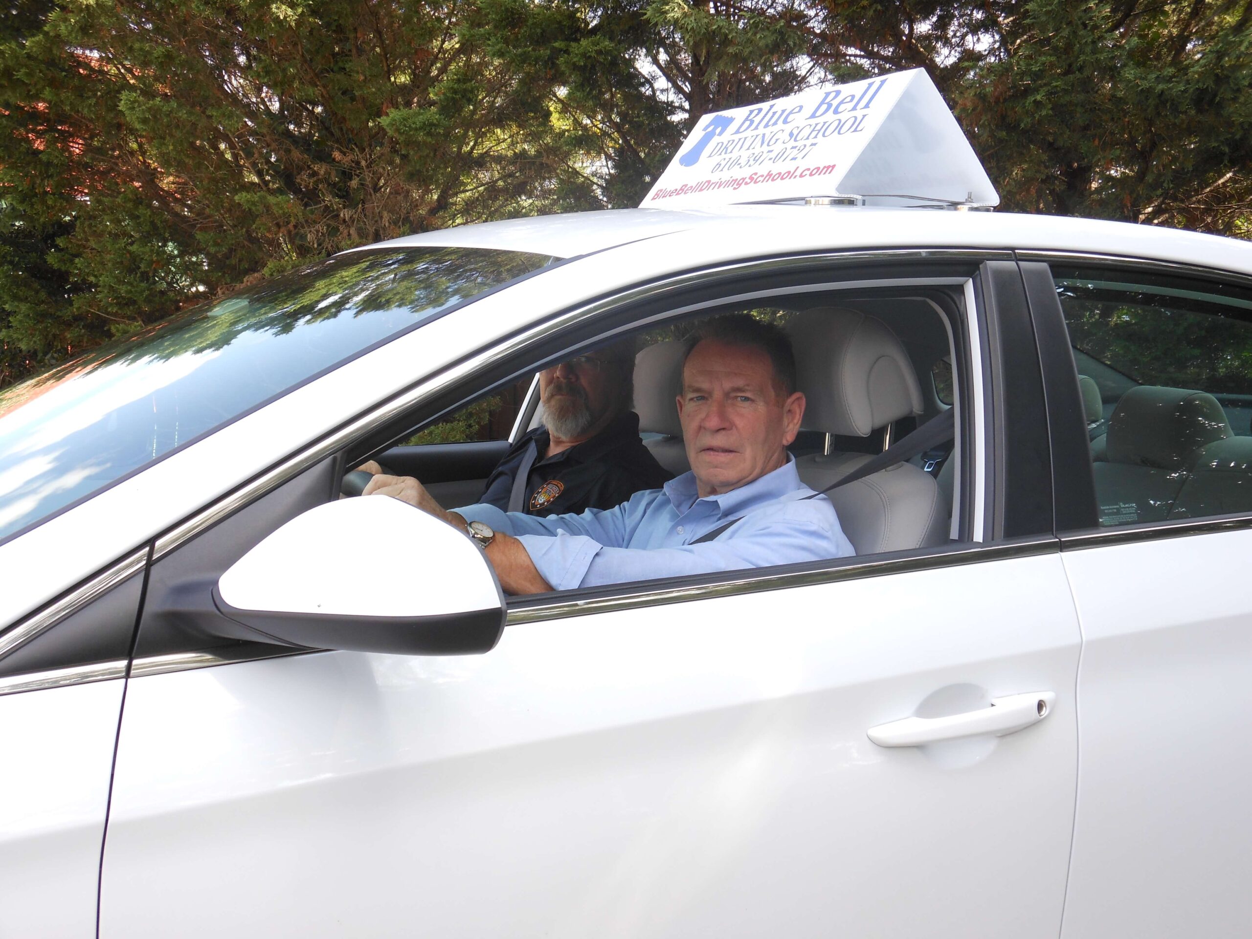 Image of man driving car